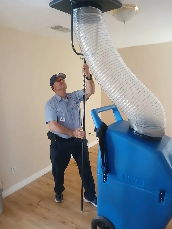 Mini Split Installation technician using HEPA equipment in Baldwinsville